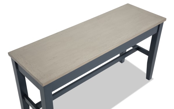 Blake Graphite & Gray counter height storage dining bench in cottage style, featuring a gray MDF and mango wood top with graphite solid wood legs and hidden storage.