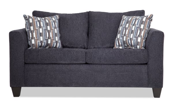 Stevie Charcoal 65'' Loveseat in gray polyester fabric with transitional style, flair arms, oversized seating, memory foam cushions, and patterned accent pillows.