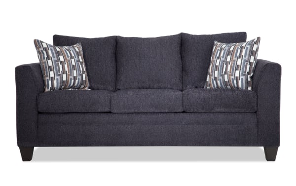 Stevie Charcoal 78'' transitional sofa in gray polyester fabric with flair arms, oversized seating, removable cushions, and patterned accent pillows.