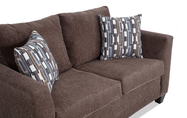 Stevie Brown 65'' Loveseat in brown polyester fabric from the Stevie collection, featuring transitional style, flair arms, oversized seating, and patterned accent pillows.