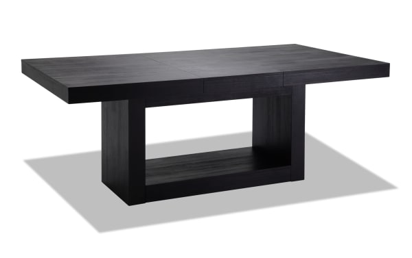 Contemporary Cosmopolitan extendable dining table in black MDF and rubberwood with acacia veneer, part of the 11-piece black & navy velvet upholstered set.