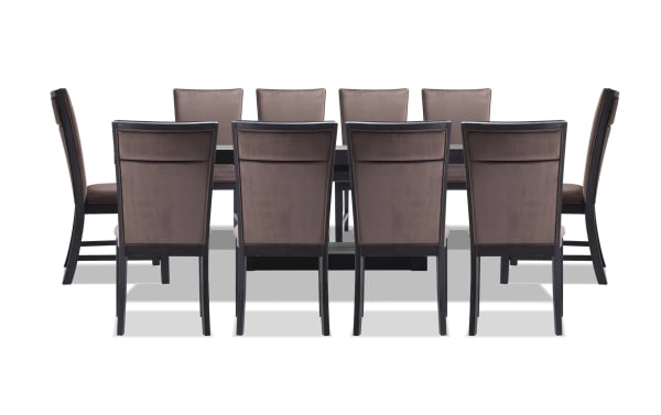 Contemporary Cosmopolitan 11 Piece Dining Set with extendable black and chocolate velvet upholstered chairs, MDF and rubberwood table, velvet fabric seats with memory foam for comfort.