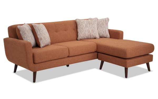 Bettie Russet 86'' Chofa mid-century modern sofa in orange polyester fabric with adjustable chaise, four patterned accent pillows, tufted back, and wooden legs.