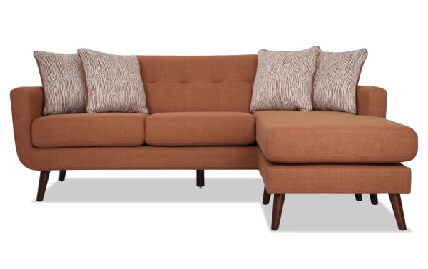 Mid-century modern Bettie Russet 86'' Chofa & 65'' Loveseat set in russet polyester fabric with tufted backs, track arms, wooden legs, and patterned accent pillows.
