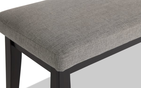 Elm Espresso & Light Gray Upholstered Dining Bench with light gray polyester fabric seat and espresso MDF legs, transitional style from Elm Dining collection