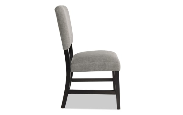 Transitional Elm Dining Chair in light gray polyester fabric with upholstered panel back, espresso MDF frame, and sturdy four-leg design.
