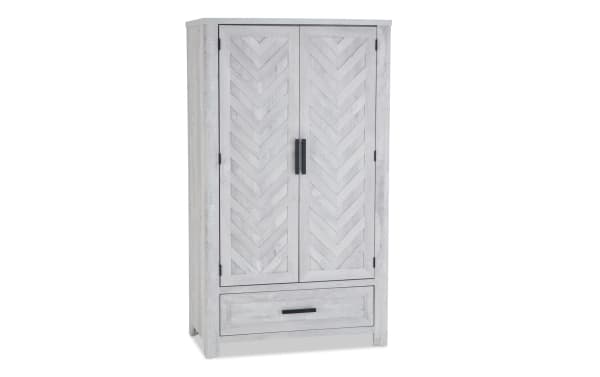 Calvin White 2 Drawer Armoire from Calvin Bedroom collection, featuring transitional style, MDF and acacia veneers, chevron door design, and black handles.