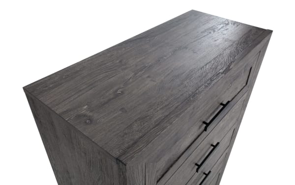 Contemporary Calvin Gray 5 Drawer Chest in engineered wood grain with dark gray plank finish, sleek black handles, and spacious storage.
