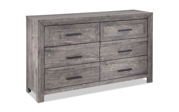 Calvin Gray 6 Drawer Dresser in engineered wood grain with a contemporary plank-style design, six spacious drawers, and dark metal handles.