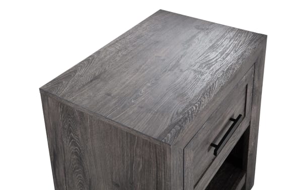 Calvin Gray Nightstand with Drawer from Calvin Bedroom collection, featuring engineered wood grain, contemporary plank-style design, and a felt-lined storage drawer.