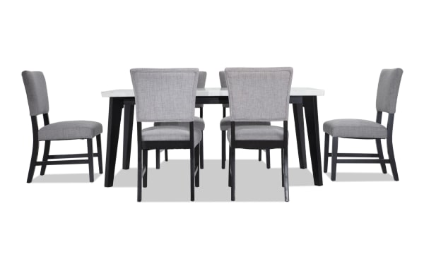 Elm 7 Piece Dining Set with light gray polyester fabric upholstered chairs, black wood legs, and a white marble MDF tabletop in a transitional style.
