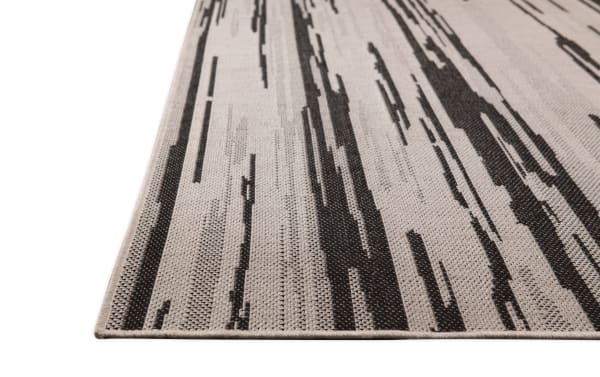 Beige Lennox Glam 8' x 10' transitional indoor/outdoor rug with abstract black linear pattern, durable polypropylene weave, and textured design.
