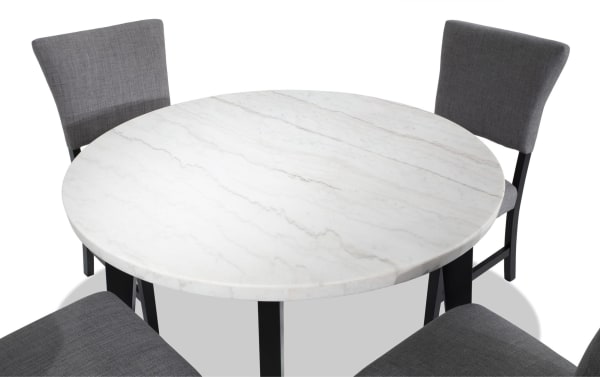 Round dining set from Elm Collection featuring a white marble tabletop, black MDF legs, and light gray polyester fabric upholstered chairs with memory foam seating.