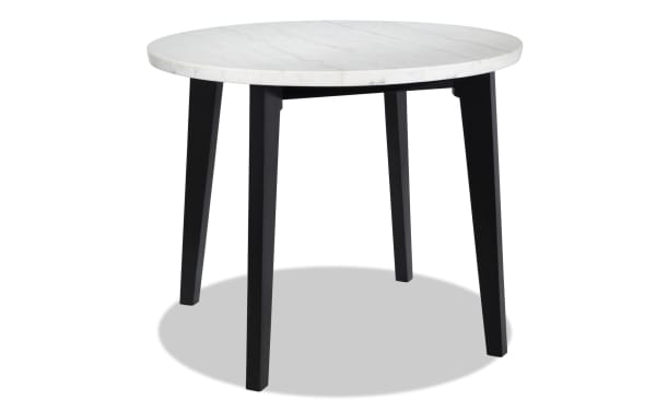 Round counter height dining table with white marble top and black wooden legs, from Elm Dining collection, transitional style.