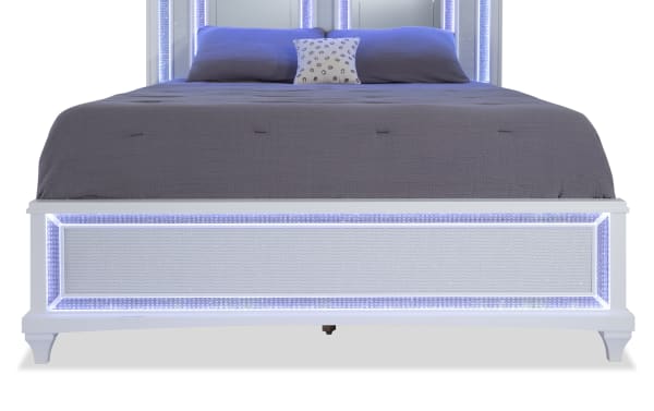Glamour Queen White Mirrored Panel Bed from Glamour Bedroom collection, featuring pearly white acacia veneer, LED touch lighting, mirrored crystal trim, and pierced fabric panel with silver backing.