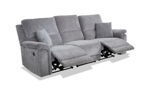 Renegade Gray 103'' power reclining sofa in gray polyester fabric with plush pillows, padded pillow-top arms, USB charging port, and transitional style.