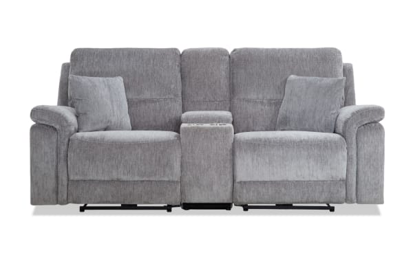 Renegade Gray 88'' power reclining console loveseat in gray polyester fabric, transitional style with padded arms, plush pillows, USB ports, cupholders, and hidden storage.