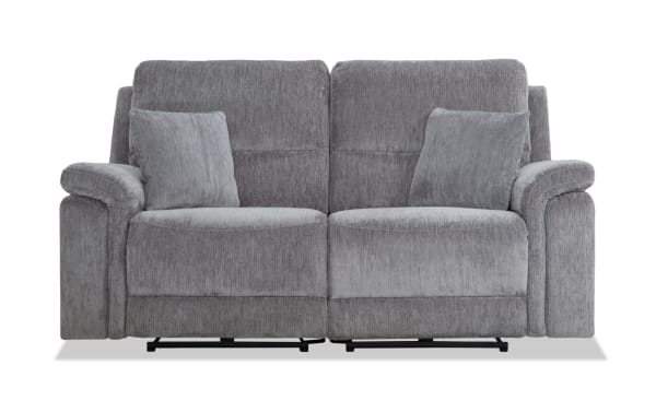 Renegade Gray 75'' power reclining loveseat in gray polyester fabric with plush pillows, padded pillow-top arms, USB ports, and transitional style.