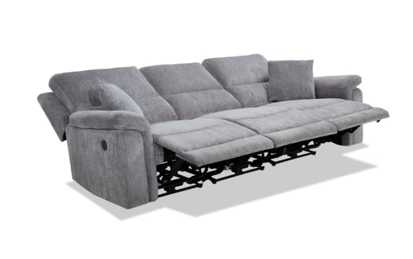 Renegade Gray 103'' power reclining sofa in gray polyester fabric with armless recliner, plush pillows, padded arms, and built-in USB port.