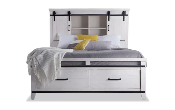 Montana 4 Piece Queen White Bookcase Storage Bedroom Set in rustic pine solids and veneer, featuring a white bookcase bed with sliding barn doors, built-in USB ports, power outlets, and two footboard storage drawers with black metal accents.