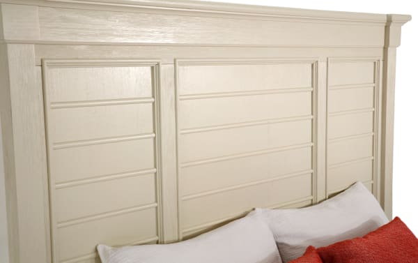 Laurel Queen White Panel Bed headboard in cottage style with tall, paneled acacia and oak veneers, part of the Laurel Bedroom collection.