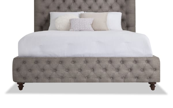 Scarlett King Gray Upholstered Panel Bed in cottage style with gray polyester fabric, tufted headboard and footboard, wooden legs, plush design.