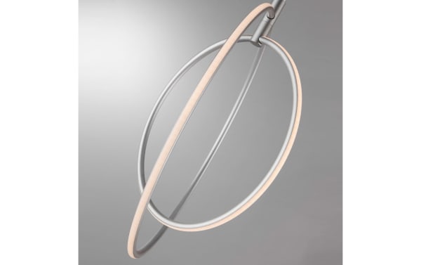 Contemporary Aspen 81'' silver metal LED arch floor lamp with overlapping orbit-style rings emitting a cool, modern glow.