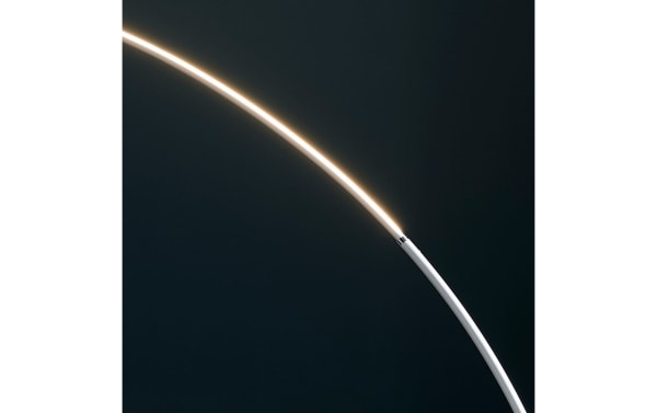 Contemporary Aspen 81'' Silver LED Arch Floor Lamp with sleek metal frame and unique overlapping LED design emitting a cool orbit-style glow.