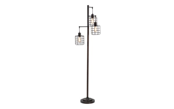 Brooklyn Caged Motif 71'' Black Industrial Floor Lamp with three metal cage shades on a tall black gilded post, providing ambient lighting.