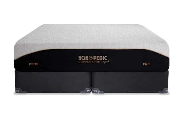 Bob-O-Pedic Copper Sport Hybrid 11.5'' Queen Dual Split Standard Mattress Set with plush and firm sides, white quilted top, black copper-threaded cover, and dark gray base.