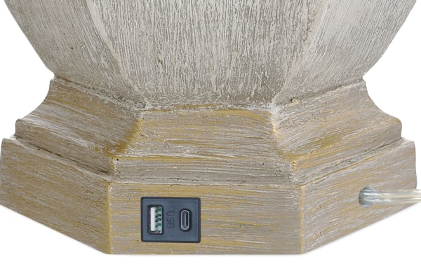 Base of Montana Ivory Table Lamp in rustic ivory resin with distressed finish, featuring built-in USB and USB-C charging ports.