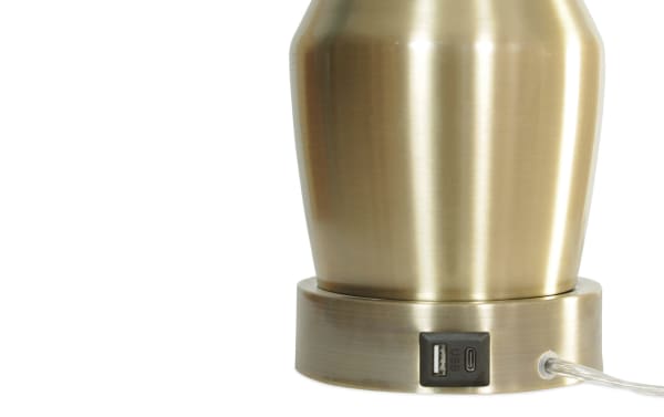 Rayna Brass Table Lamp base in brushed brass metal with built-in USB and USB-C charging ports, transitional style, part of a white linen fabric set.