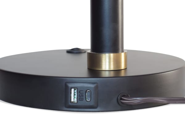 Contemporary Hunter Blackened Bronze & Gold metal table lamp base with built-in USB and USB-C charging ports, beige linen shade not shown.