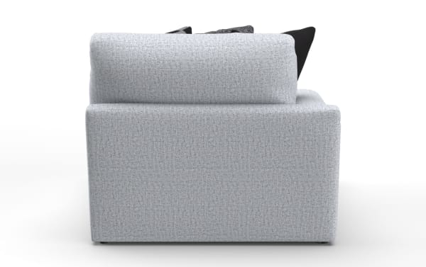 Modern light gray fabric sofa side view with textured upholstery and black accent pillows, suitable for contemporary living room decor.