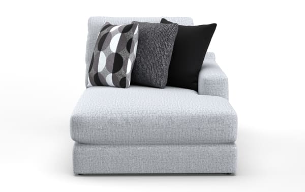 Modern light gray fabric chaise lounge with textured upholstery, right armrest, and three decorative black and gray throw pillows.