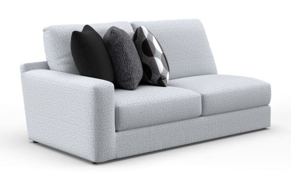 Modern light gray fabric sofa with clean lines, featuring three decorative black and patterned throw pillows, ideal for contemporary living rooms.