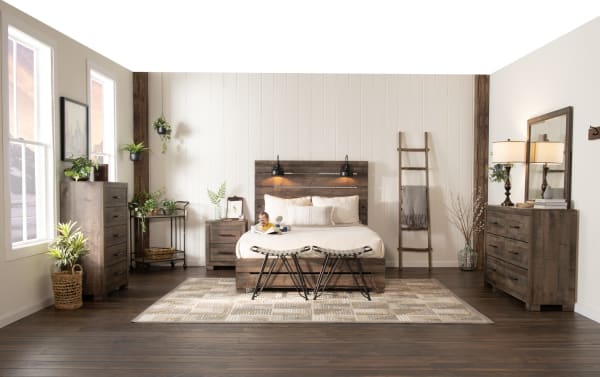 Foundry Queen Brown Storage Platform Bed in rustic MDF and engineered wood grain with paneled slat headboard, black lamps, and USB port from Foundry Bedroom collection.