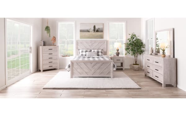 Calvin Twin White Panel Bed from Calvin Bedroom collection, transitional style engineered wood grain with chevron design on headboard and footboard, natural wood texture, clean silhouette in a bright bedroom setting.