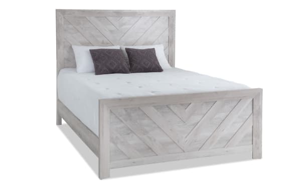 Calvin Twin White Panel Bed from Calvin Bedroom collection, transitional style with engineered wood grain, chevron headboard and footboard design.