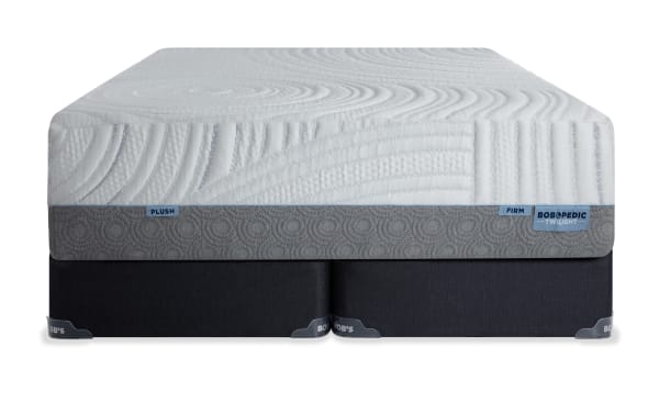 Twilight 15.5'' California King Dual Split Standard Mattress Set by Bob's, featuring plush and firm sides, white quilted top with gray patterned border, and premium ventilated Bob-O-Pedic Gel Memory Foam with Charcoal for targeted support and cooling.