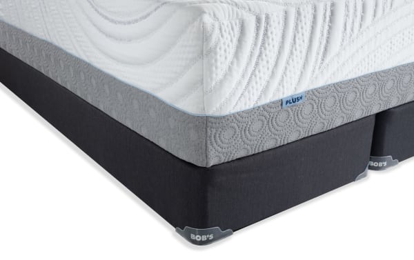 Twilight 15.5" California King Dual Split Standard Mattress Set by Bob's, featuring plush white quilted top with blue trim, gray patterned sides, and black fabric base.