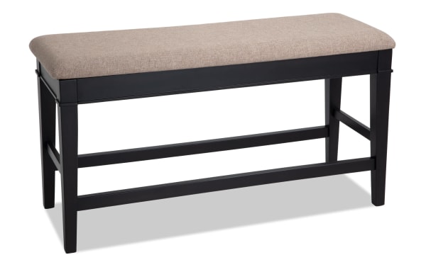 Montana Black & Beige Upholstered Counter Height Storage Dining Bench with beige polyester fabric cushion, black wood frame, and rustic style.