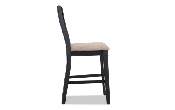 Montana Black & Beige Slat Back Upholstered Counter Height Stool with beige polyester fabric, rustic rubberwood frame, and memory foam seat cushion.