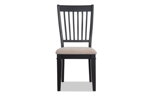 Montana Black & Beige Slat Back Upholstered Dining Chair with beige polyester fabric seat, black rubberwood frame, rustic style, and memory foam cushion.