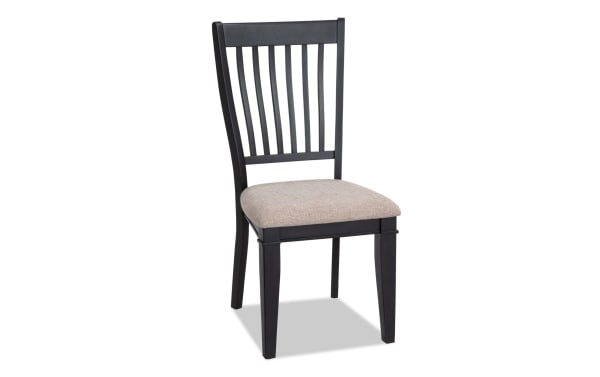 Montana Black & Beige Slat Back Upholstered Dining Chair with beige polyester fabric seat and black rubberwood frame, rustic style.