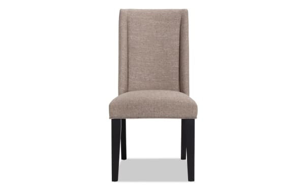 Montana Black & Beige Solid Back Upholstered Dining Chair with beige polyester fabric, black MDF legs, rustic style, and memory foam seat cushion for comfort.