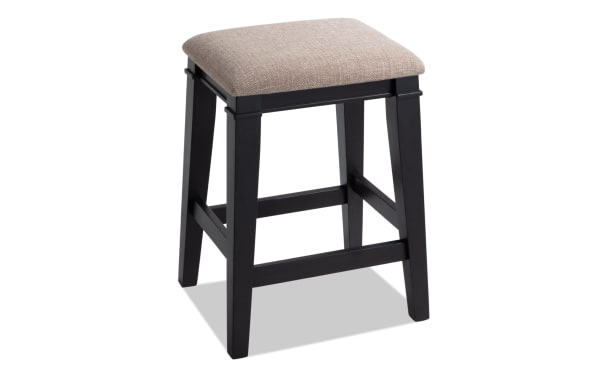Montana Black & Beige Backless Upholstered Counter Height Stool with beige polyester fabric seat, black MDF frame, rustic style, and memory foam cushion.