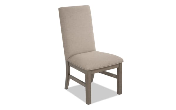 Artisan Beige & Gray solid back upholstered dining chair with beige polyester fabric, oak veneer frame, and transitional style from Artisan Dining collection.