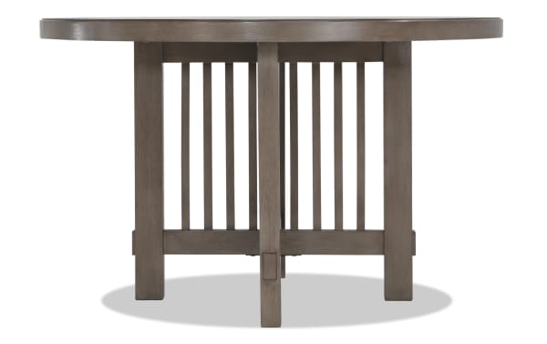 Artisan Gray Round Dining Table in transitional style with gray oak veneer top, MDF and Asian hardwood solids base, vertical slat pedestal legs.