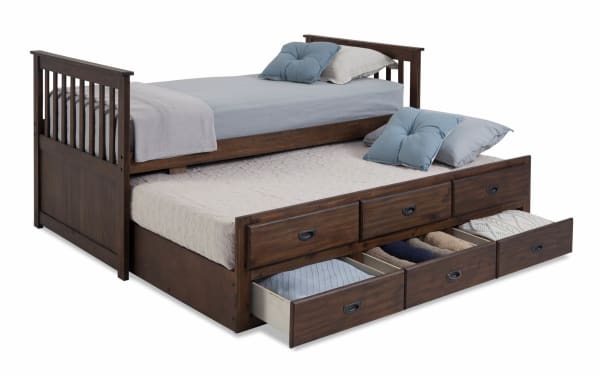 Chadwick Twin Brown Storage Captain Bed with Twin Trundle in transitional style, made of MDF, poplar solids, and veneers, featuring dark brown finish, slatted headboard, and six pull-out storage drawers beneath the trundle bed for clothing and shoe organization.